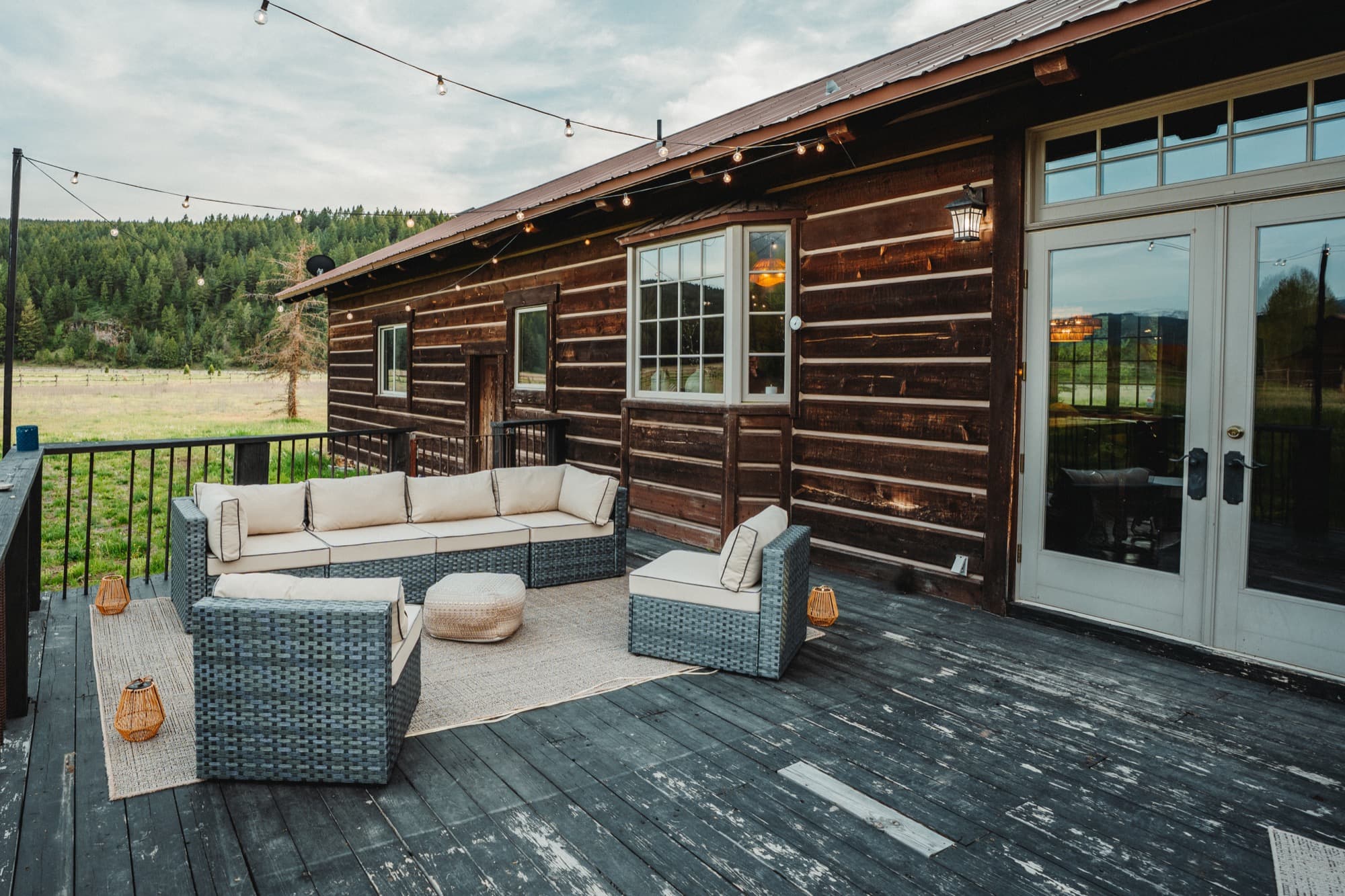 Outdoor lounge furniture on the cabin deck on a clear day